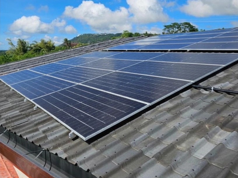 Solar panels installed on a residential roof in the Philippines